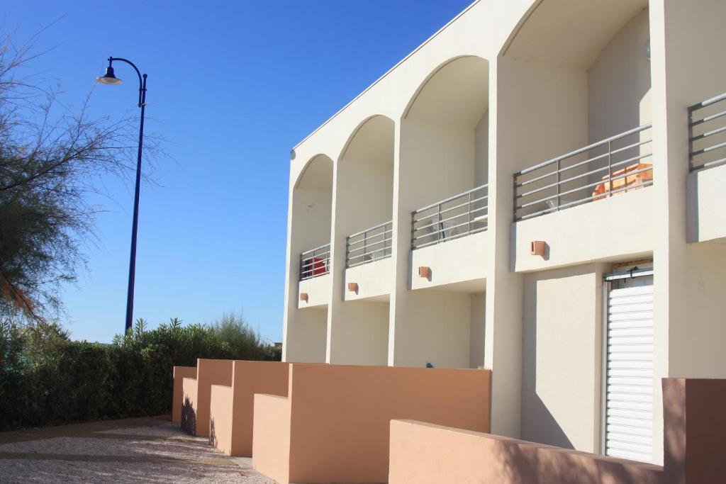 Les Stoechades Aparthotel Hyeres Bagian luar foto